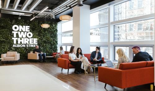 A photo of colleagues in the office